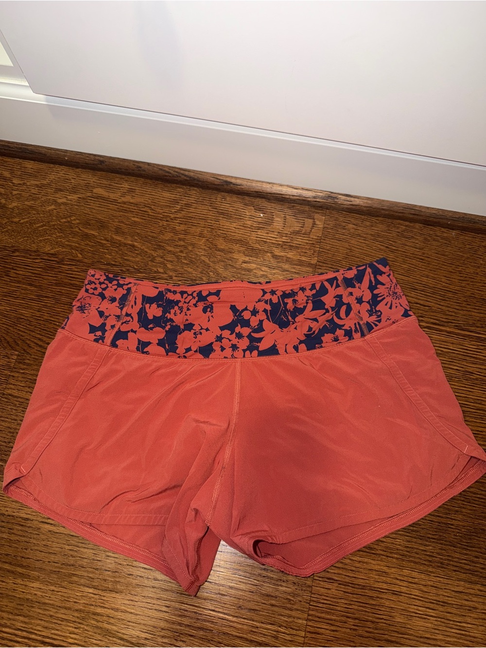 Lululemon Women's Coral Athletic Shorts with Floral Waistband